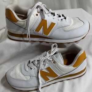 New Balance White and Gold Athletic Shoes
